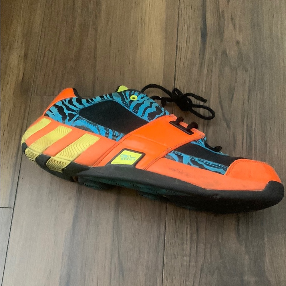 Adidas Orange and Black Athletic Shoes for Dynamic Performance